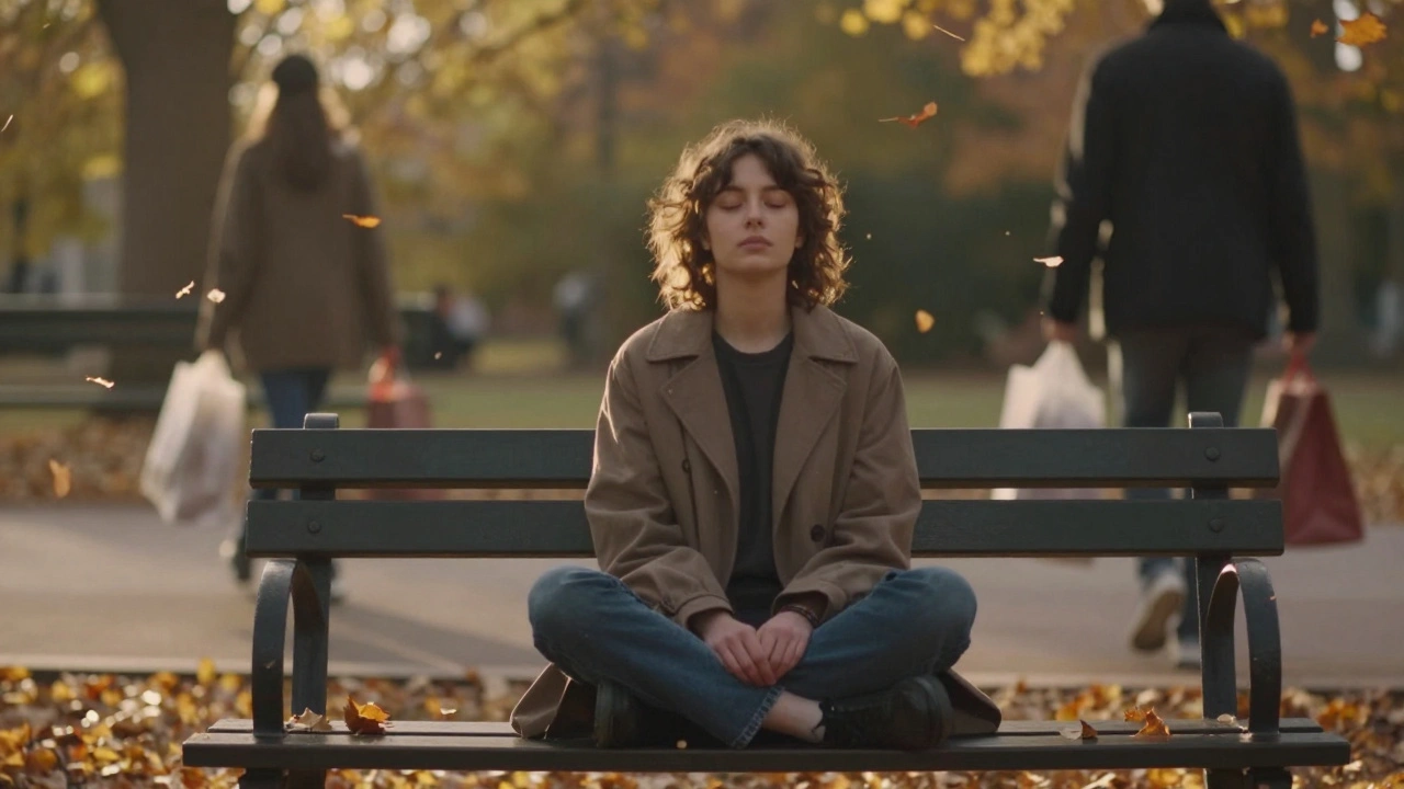 A person sitting peacefully on a park bench at sunset, surrounded by falling leaves, eyes closed in calm.